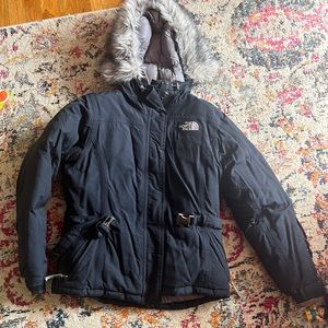 Medium black north face jacket.